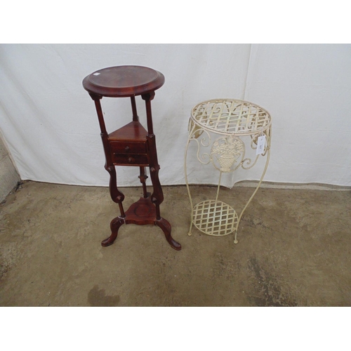 507 - Metal two tier plantstand with circular latticework top and lower tier having scrolled metal and vas... 