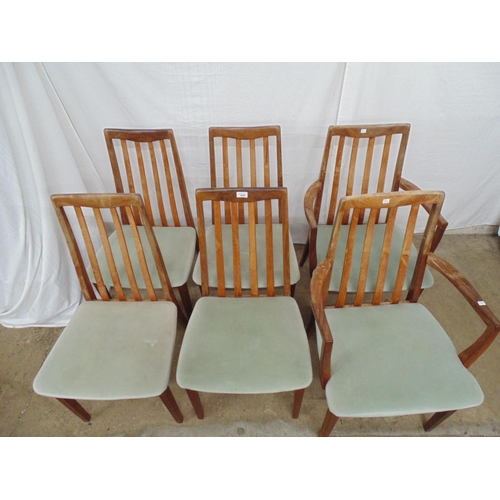 435 - Set of six (two carvers) G Plan Model No. 4540 slatted back dining chairs with pale green upholstere... 