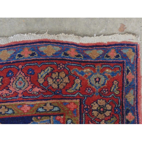 439 - Blue ground red, olive green, pink and pale blue patterned rug (end tassels af) - 1.24m x 2.6m