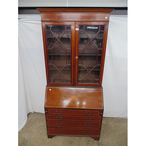 440 - Inlaid mahogany bureau bookcase the top having two astragal glazed doors opening to three shelves ov... 