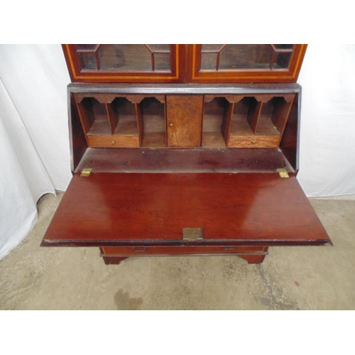 440 - Inlaid mahogany bureau bookcase the top having two astragal glazed doors opening to three shelves ov... 