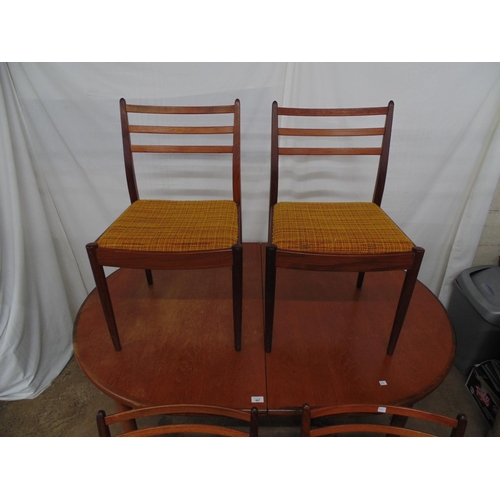 447 - Set of four G Plan mid century teak dining chairs with three bar backs and upholstered seats, standi... 