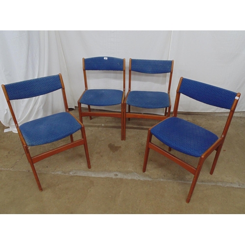 448 - Set of four mid century teak chairs with mid blue upholstered seats and bar backs, standing on taper... 