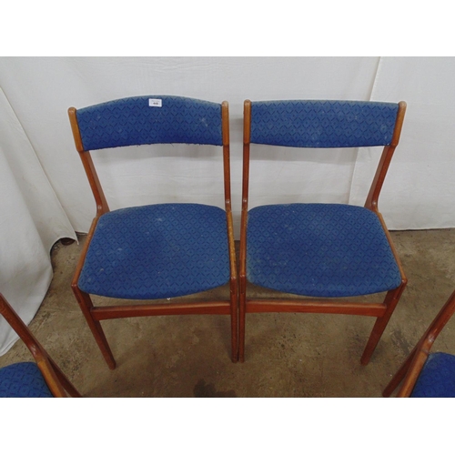 448 - Set of four mid century teak chairs with mid blue upholstered seats and bar backs, standing on taper... 