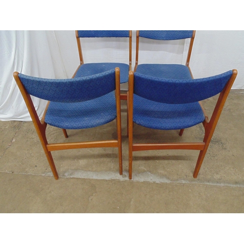 448 - Set of four mid century teak chairs with mid blue upholstered seats and bar backs, standing on taper... 