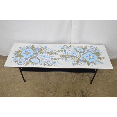 453 - Mid century Myer two tier Formica top low coffee table with metal frame and blue floral design to to... 