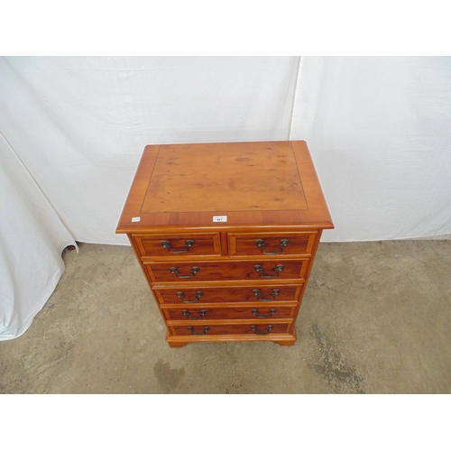 461 - Yewwood chest of two short and four long drawers with swan neck handles, standing on bracket feet - ... 