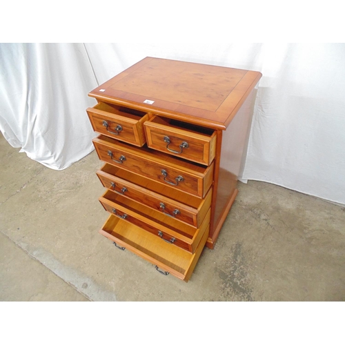 461 - Yewwood chest of two short and four long drawers with swan neck handles, standing on bracket feet - ... 