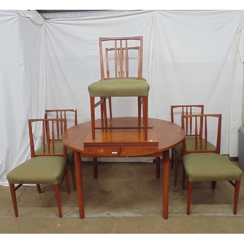 462 - Set of six standard Gordon Russell mid century dining chairs with three spindle backs, green upholst... 