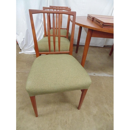 462 - Set of six standard Gordon Russell mid century dining chairs with three spindle backs, green upholst... 