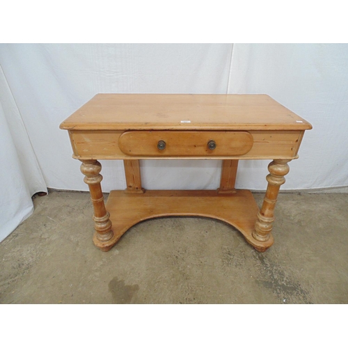 467 - Pine two tier side table/washstand having single drawer, turned columns leading to shaped second tie... 