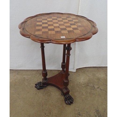 472 - Rosewood chess top occasional table having scalloped edge and standing on three turned legs leading ... 