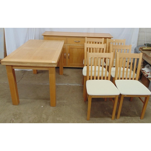 473 - Modern light oak dining room suite to comprise: six standard chairs with slat backs and cream uphols... 