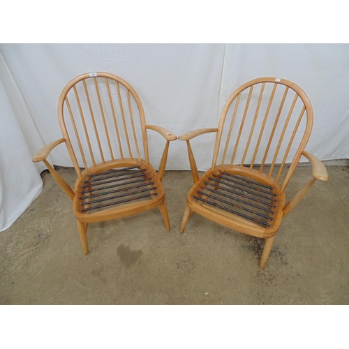 474 - Pair of Ercol style bentwood stick back armchairs with spring bases and tapering legs with cross str... 