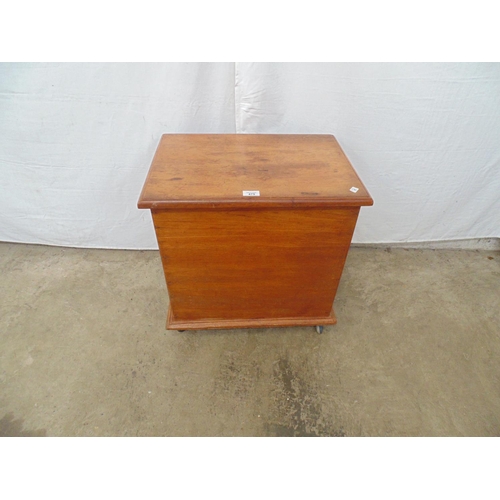 475 - Cedarwood box having hinged lid opening to storage space, standing on castors - 55cm x 39cm x 55cm t... 