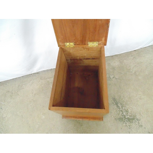 475 - Cedarwood box having hinged lid opening to storage space, standing on castors - 55cm x 39cm x 55cm t... 