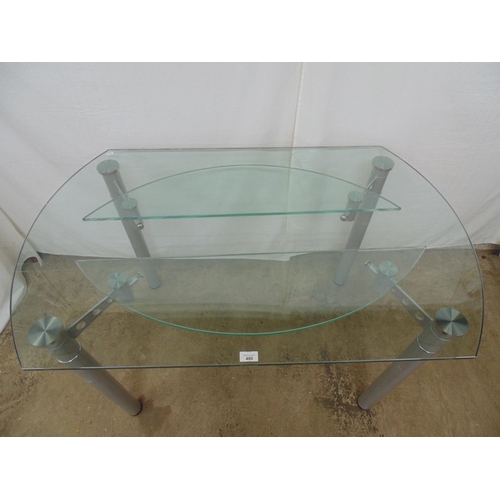 480 - Modern glass topped dining table having two glass swing out additional leaves, standing on four tubu... 