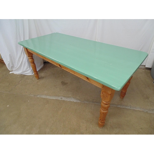 481 - Pine kitchen/dining table having painted green top, standing on turned tapering legs - 180cm x 83cm ... 