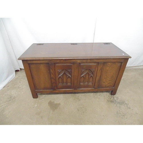 503 - 20th century oak coffer having two plain and two carved panelled front, standing on block feet - 112... 