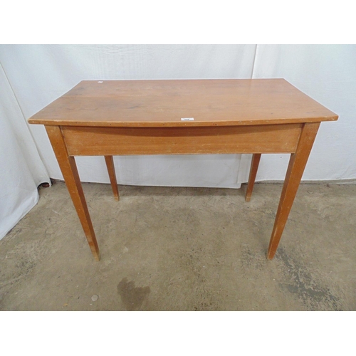 506 - Pine side/occasional table having two plank top and standing on four tapering legs (both back legs h... 