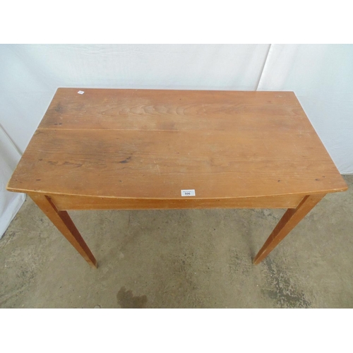 506 - Pine side/occasional table having two plank top and standing on four tapering legs (both back legs h... 