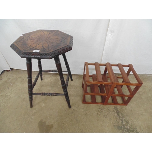 525 - Carved oak octagonal occasional table standing on turned stretchered legs - 46cm x 46cm x 69cm tall ... 