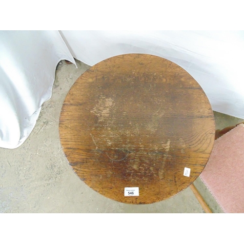 546 - Circular oak coffee table the top supported on a baluster column leading to cruciform base - 46cm di... 