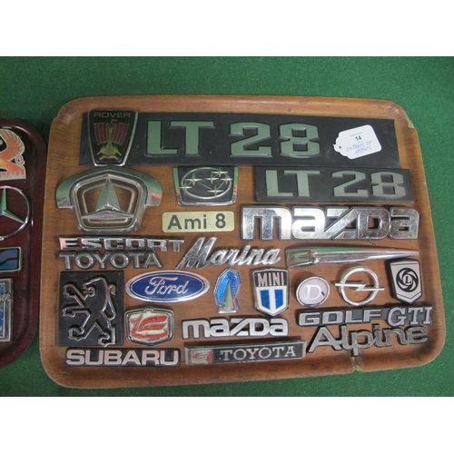 14 - Two trays of metal and plastic vehicle manufacturers badges to include: Ford, Avenger, Golf GTI, Sub... 