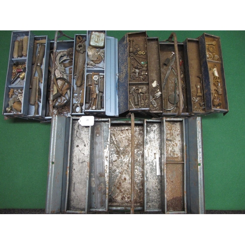 28 - Three cantilever metal tool boxes containing various old tools and motorcycle parts