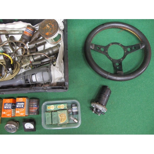 38 - Mixed crate containing: SU electric petrol pump, steering wheel, bulbs, grease guns, amp meter (USA)... 