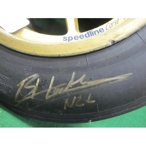 39 - Used racing car wheel and tyre (Avon 250/57 OR13) marked in white for Thruxton 2008 and signed - 22