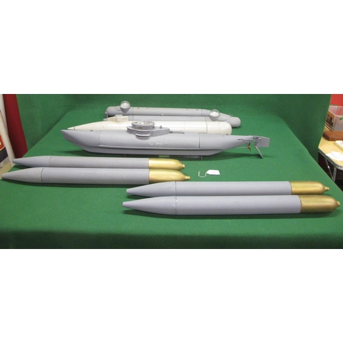 412 - Four large submersible models together with four possibly torpedo models, all of plastic and wood co... 