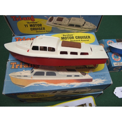 413 - Nine boxed plastic clockwork model boats from Triang and Scalex-Minimodels together with a Cecil Ser... 