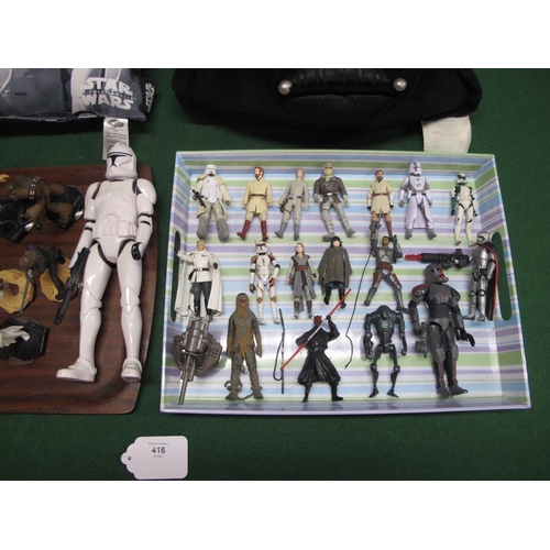 416 - Quantity of 2000's plastic Star Wars figures made by Hasbro and The Walt Disney Company to include: ... 