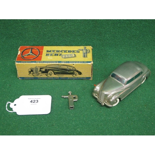 423 - A Prameta (W. Germany) all metal clockwork Mercedes Benz 300 with steering, forwards & reverse and i... 