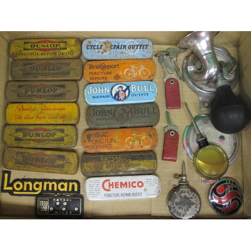 9 - Thirteen puncture repair tins, small bulb horn etc together with three lead printing plates for Morr... 