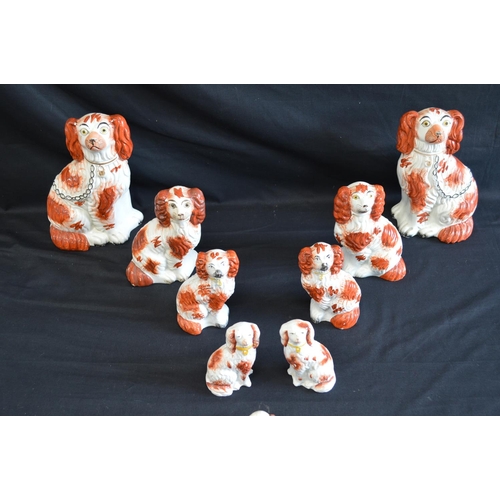 121 - Four pairs of Staffordshire figures of Spaniels together with two other Staffordshire Spaniels - tal... 