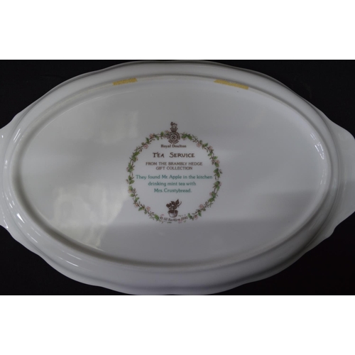 129 - Royal Doulton Bramley Hedge miniature four piece tea set to comprise: oval serving tray, teapot, cre... 