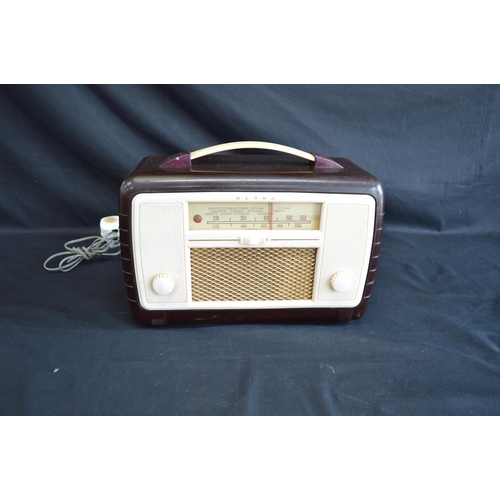 175 - Ultra Bakelite radio with top carrying handle - 30.5cm wide together with a reproduction gramophone ... 