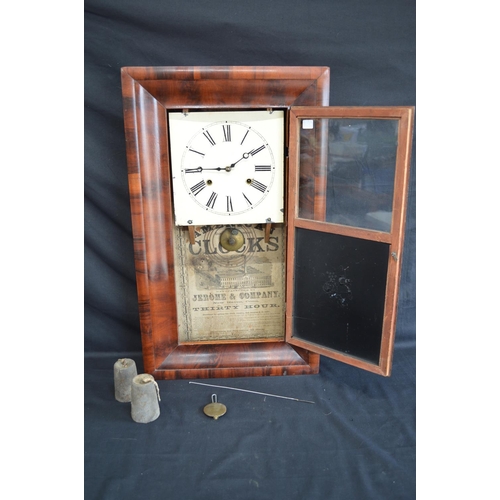 176 - Mahogany cased American wall clock having painted dial and black Roman Numerals - 39cm x 65cm tall