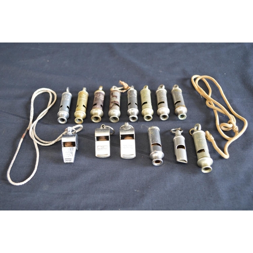 185 - Group of fourteen whistles to include: two Thunderer, Metropolitan Police whistle No. 65298, Emca Ci... 