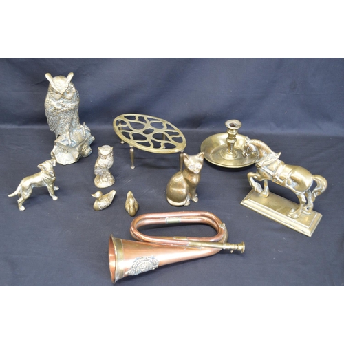 223 - Quantity of brass and copper ware to comprise: seven brass animal figures, chamber stick, trivet and... 