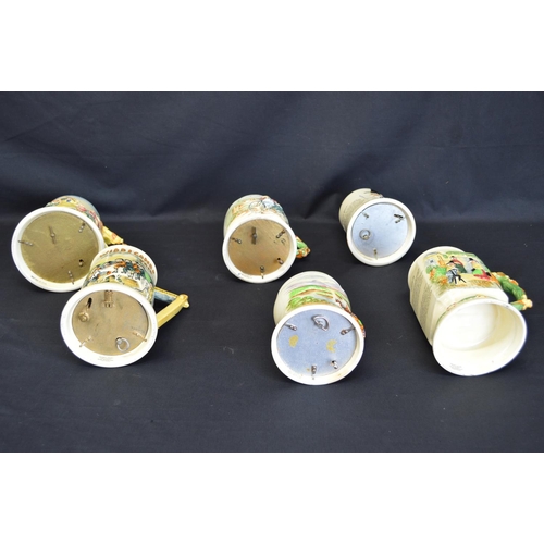 240 - Group of ceramics and glassware to include: musical tankards, three Wedgwood animal paperweight figu... 