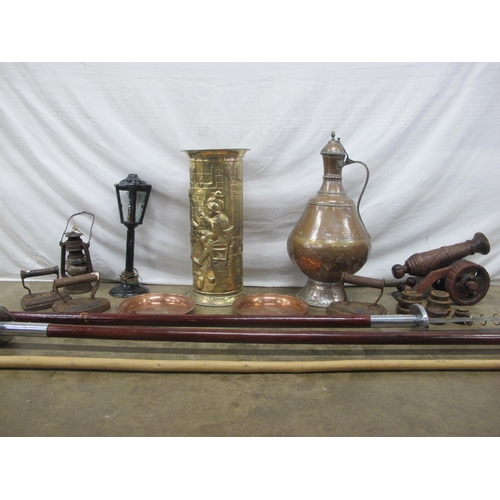 27 - Collection of metalware to include: brass stick stand, copper ewer, three flat irons and two copper ... 