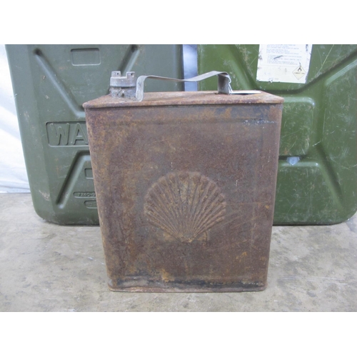 29 - An unrestored Shell petrol can with Shell cap together with metal jerry can and plastic water contai... 