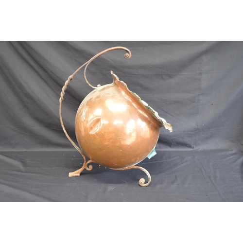 31 - Arts & Crafts copper coal scuttle of globular shape having fluted opening with scrolled metal handle... 