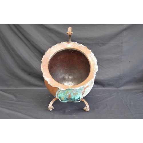 31 - Arts & Crafts copper coal scuttle of globular shape having fluted opening with scrolled metal handle... 