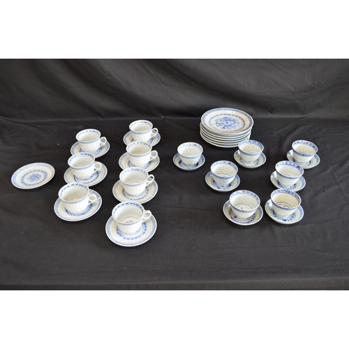 45 - Late 20th century Oriental part teaset having blue dragon decoration on a white ground with blue bac... 