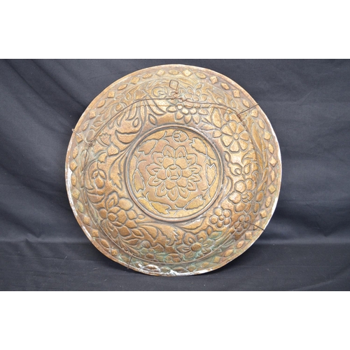 52 - Persian copper charger having enamel decoration of flowers - 40cm dia