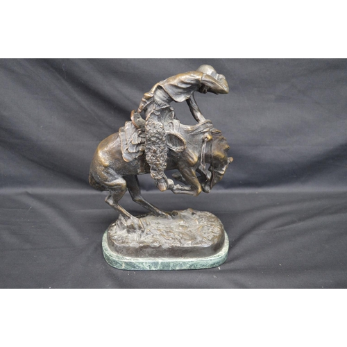 55 - After Frederic Remington (1861-1909) bronze sculpture titled Rattlesnake having incised signature on... 